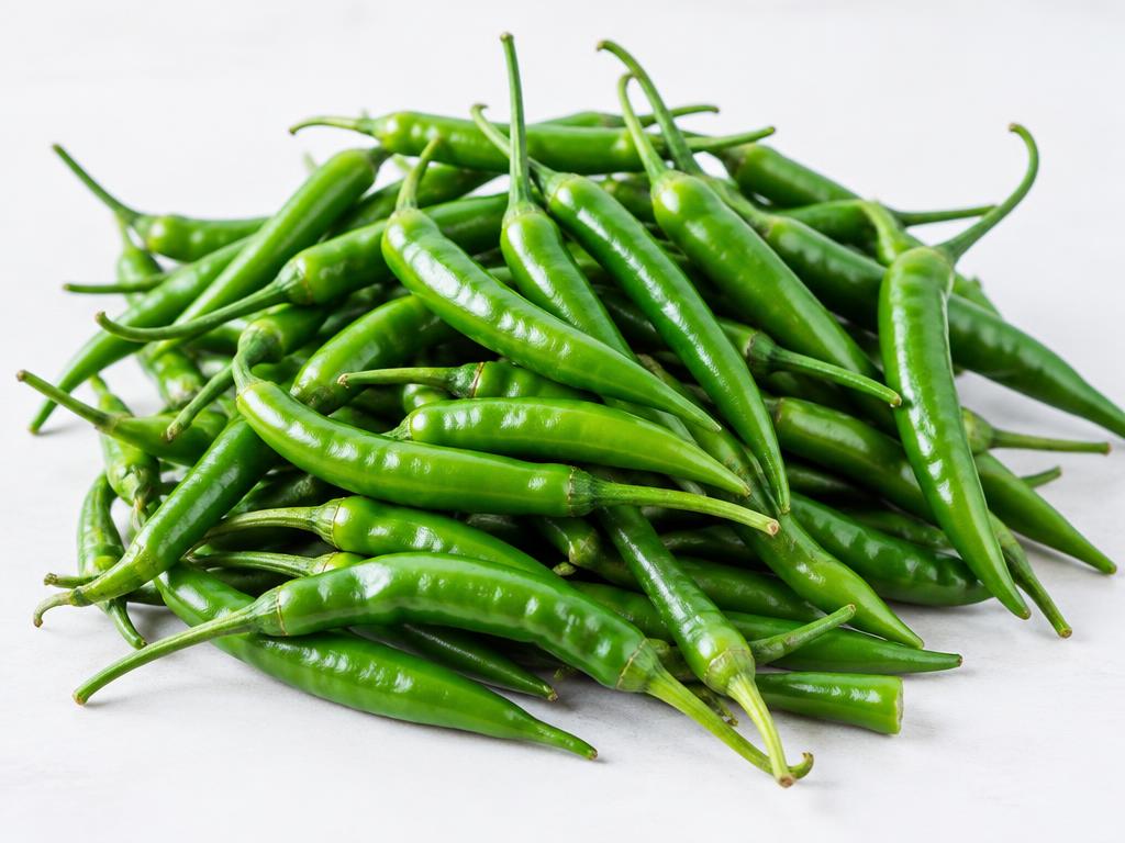 Fresh green chillies with natural colour and texture